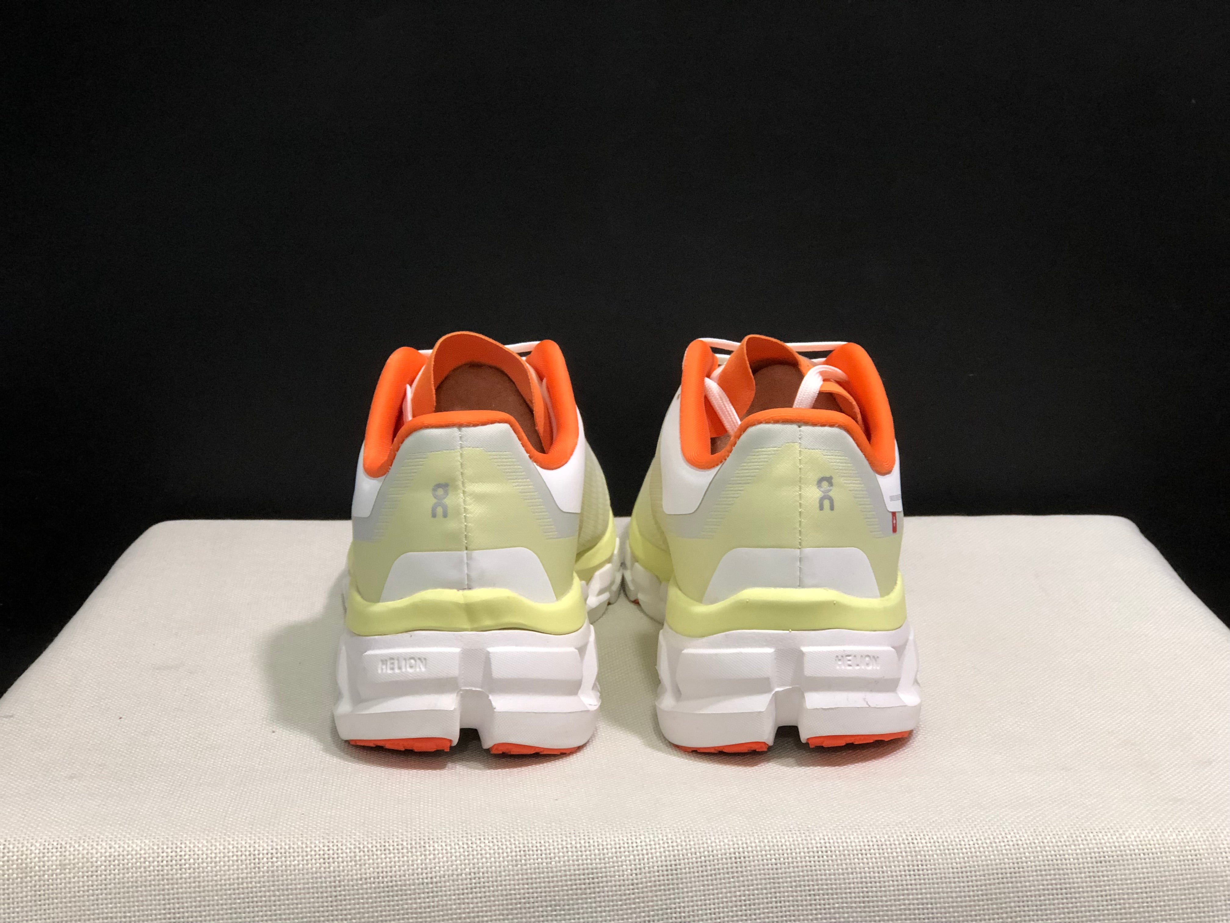 On Cloud Cloudflow 4 New Generation green and orange running Shoes back view 