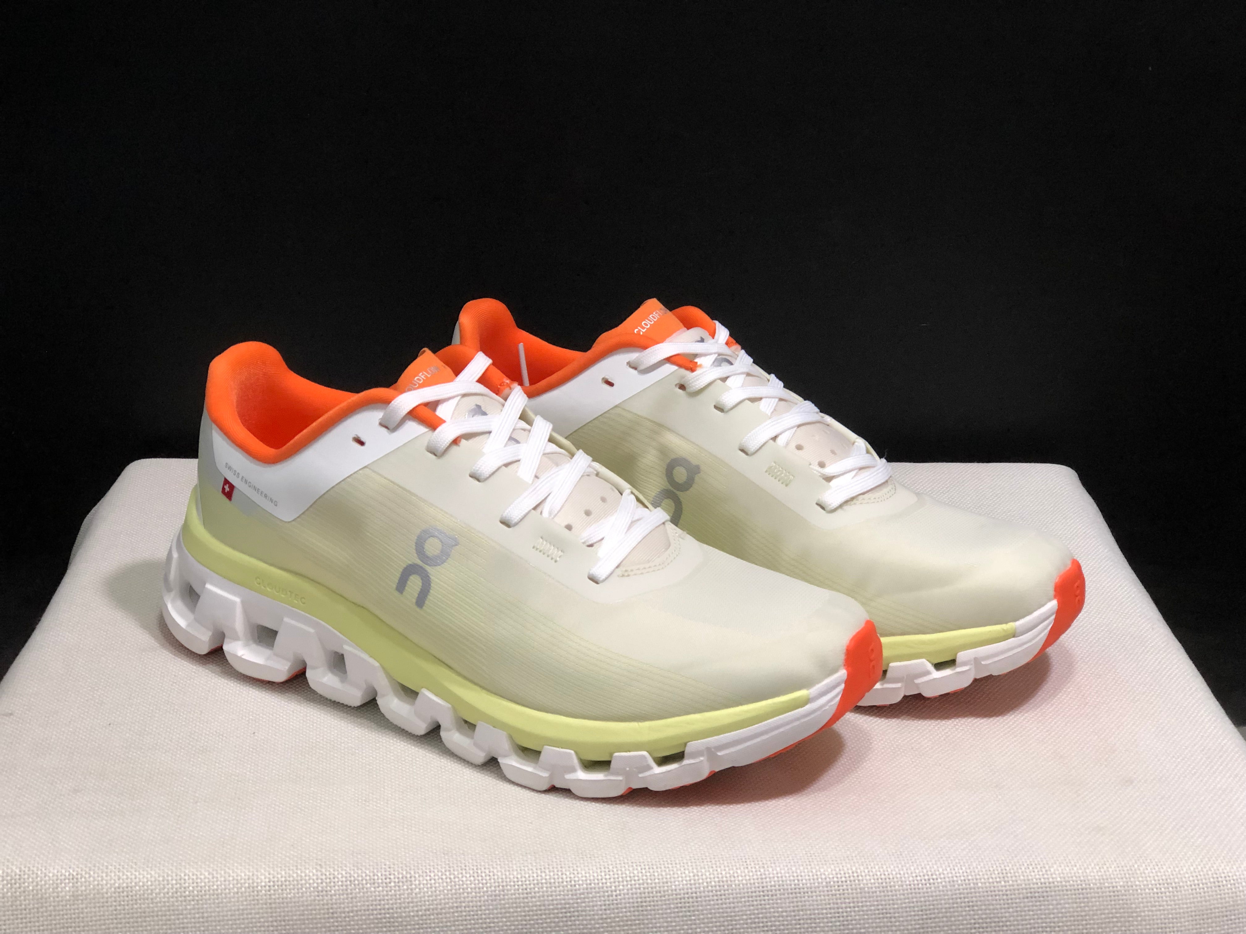 On Cloud Cloudflow 4 New Generation green and orange running Shoes  pair 