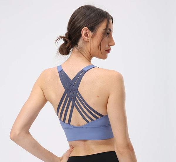 NWT Cross Tank Yoga top Backless Push Up Crop Bra Size XS-XLThis NWT Cross Tank yoga top is designed to provide comfort and style in the studio. The backless cut and push-up design coupled with the cotton spandex blend fabric0formyworkout.com